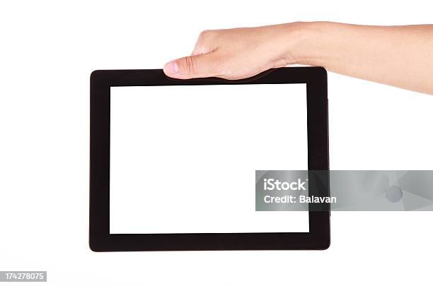 Foto de Mão Segurando A Tablet Digital Com Tela Em Branco Sobre Fundo Branco e mais fotos de stock de A caminho