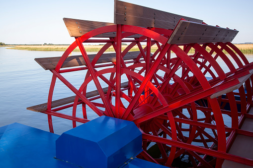 Red paddle wheel of a river steamboat