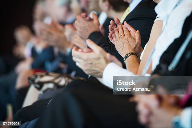 Applauding Businesspeople In A Row Stock Photo - Download Image Now - Meeting, Press Conference, Clapping