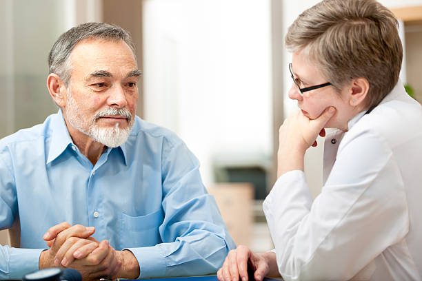 istock Doctor and patient deep in thought in a medical exam 174280011