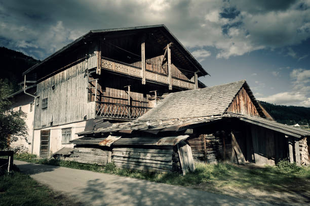 Old farmhouse and barn, Dolomites, Alto Adige - toned image