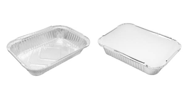 istock Foil baking dish closeup isolated on a white background. Empty disposable square aluminium foil baking dish isolated on white 1742804183