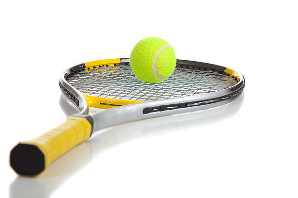 istock Tennis ball and racket on white 174280944