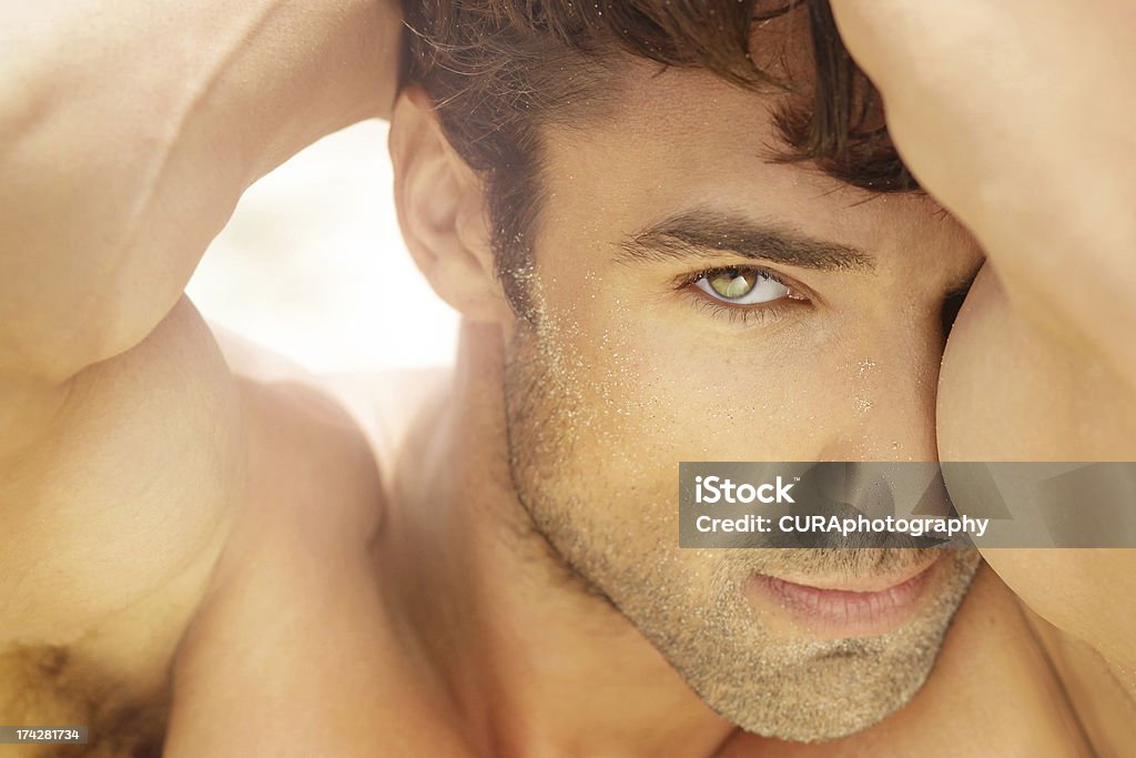 Beautiful man up close Closeup portrait of a beautiful male model Men Stock Photo