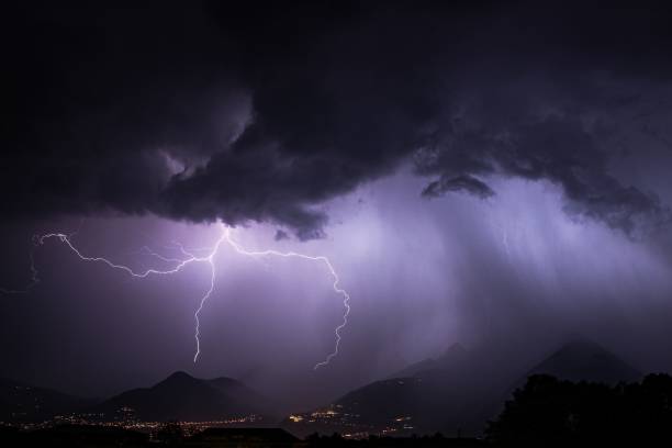 istock Landscape view of a thunderstorm with lightning bolts over a mountain range 1742825401