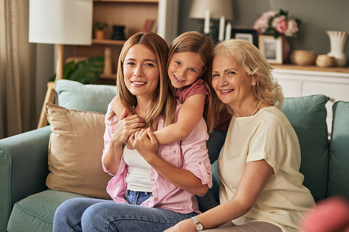 Three female generation portrait at home