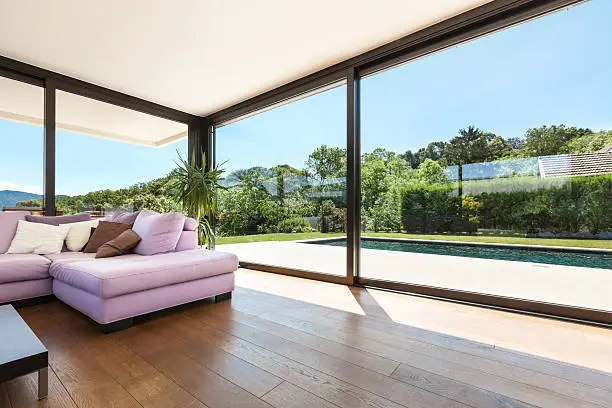 Photo of Interior of a modern villa with pink divan