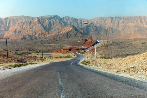 istock Highway along high lifeless mountains in Oman 1742866934