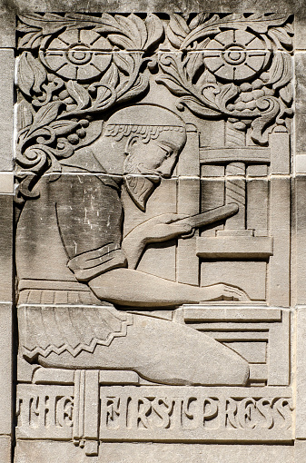 Art Deco bas-relief The First Press on facade at 2 North Riverside Plaza (formerly called the Chicago Daily News buidling),  Chicago, Illinois, USA. Sculpted by Alvin Meyer. Building opened in 1929.