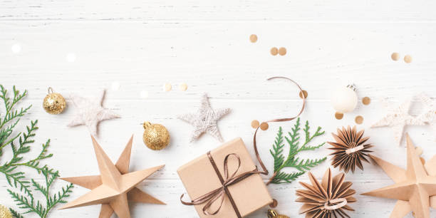 istock Festive Christmas background with gift box and Christmas decorations 1742878555