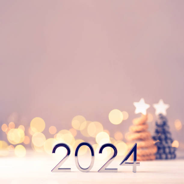 istock Metal numbers 2024 on table with bokeh lights. 1742882367