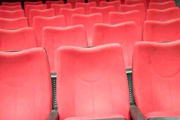 istock Rows Of Empty Seats In a Theater 1742885081