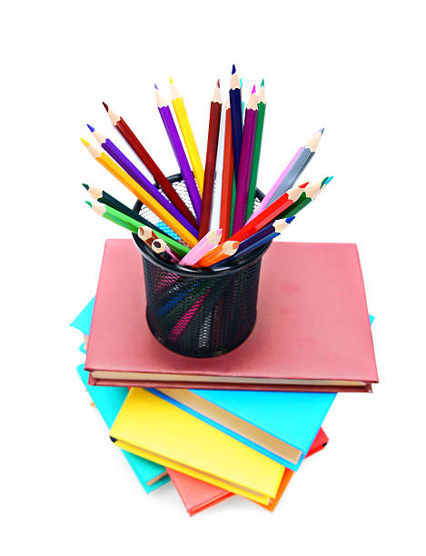 istock Multi-coloured books ,basket with pencils. 174289555
