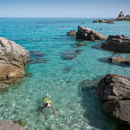 Snorkeling at Michelino beach. Parghelia-Tropea, Vibo Valentia Province, Calabria, Italy.