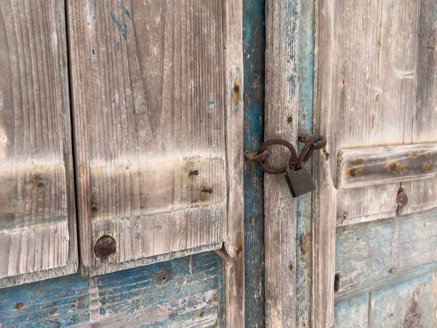 istock old wooden door with padlock 1742939975