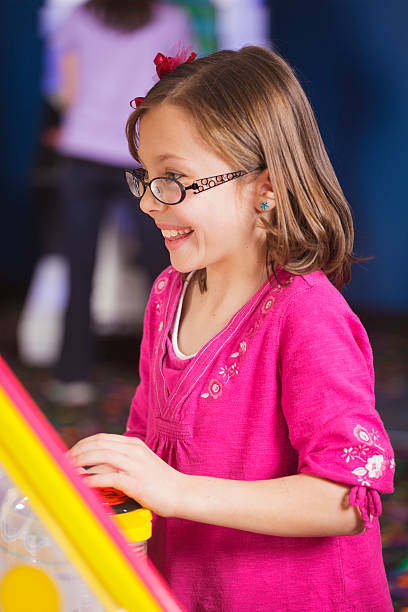 Little Girl in an Amusement Arcade