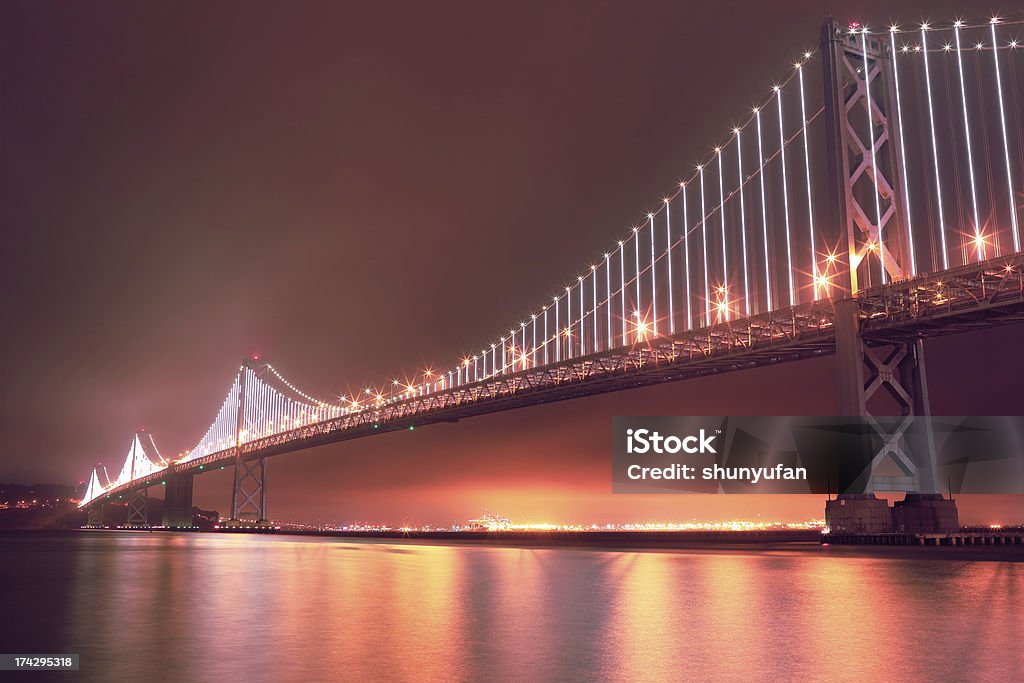 San Francisco: Bay Bridge from Embarcadero Bay bridge at night at San Francisco Bridge - Built Structure Stock Photo
