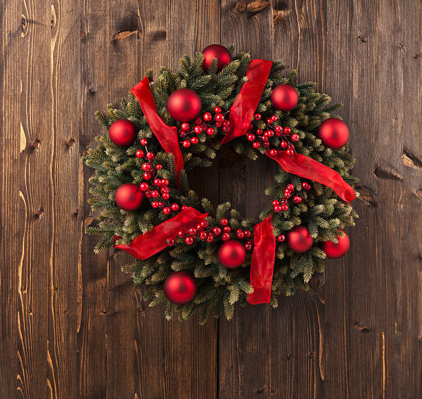 istock Christmas wreath made from fir branches and red baubles 174295554