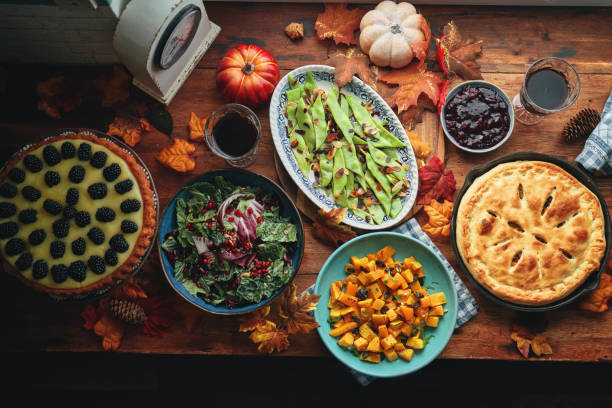istock Vegan Thanksgiving Dinner with Pumpkin & Kale Pot Pie, Butternut Squash, Roasted Green Beans with Almond Bacon, Radicchio Clementine Salad and Berry Pie 1742983549