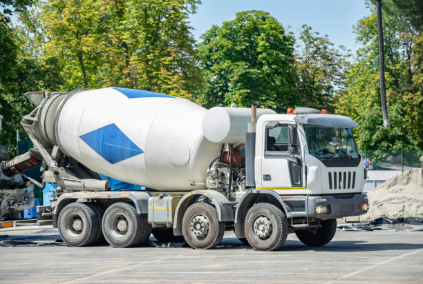 istock Cement truck with extended hydraulic systems turning cement 1742989257