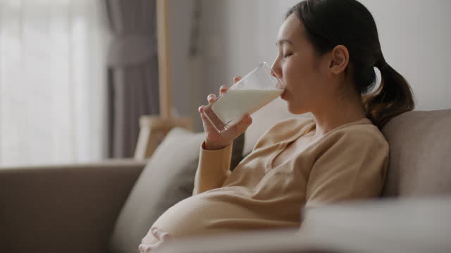 Asian Pregnant woman eats healthy food