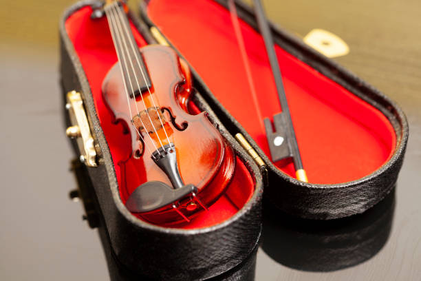 istock violin with bow in red velvet case 1743027818