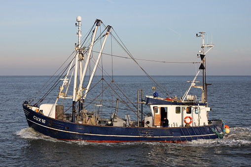 Cuxhaven, Germany - November 4, 2015: fishing vessel Horizont CUX 16 at sea