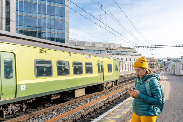 istock Backpacker woman waiting for the train 1743032731