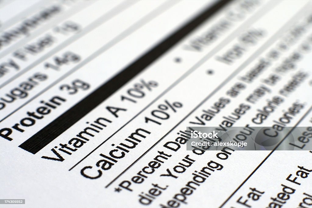 Nutrition facts and measure tape Cholesterol Stock Photo
