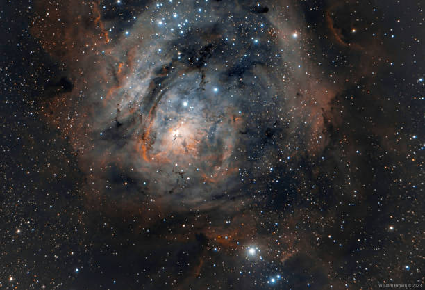 スイミングラグーン星雲 - lagoon nebula ストックフォトと画像
