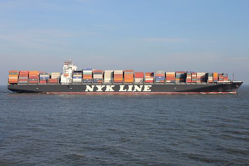 Cuxhaven, Germany - November 7, 2014: Nippon Yusen Kabushiki Kaisha (NYK) container ship NYK Oceanus on the river Elbe