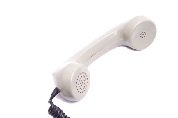 vintage ricevitore del telefono isolato su sfondo bianco - telephone receiver flash foto e immagini stock