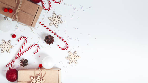 istock Christmas background with decorations, gift boxes on a white table. Christmas background. Flat lay. top view with copy space 1743074938