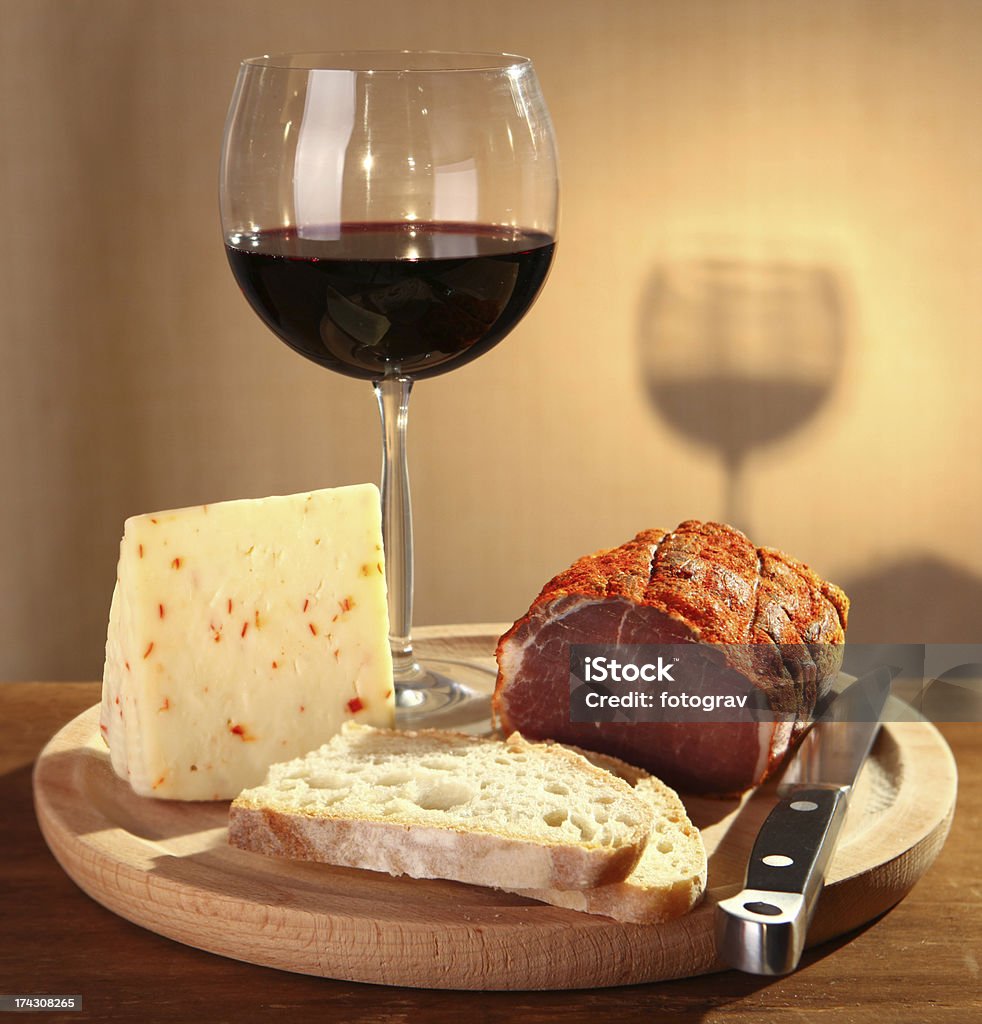 Red wine with italian cheese and capocollo Red wine with italian cheese and capocollo. Backgrounds Stock Photo