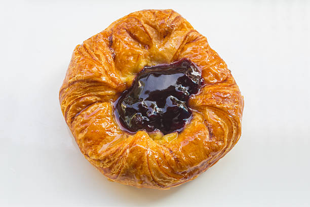 Studio shot of lattice top puff pastry mince pie cut out against a white background