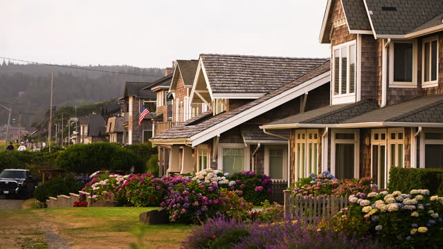 Slow motion shot of seafront apartments overlooking Canon Beach, Oregon