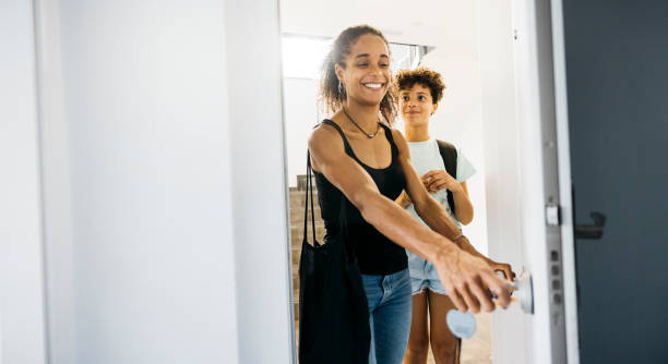 istock Mother and her daughter arriving home 1743100783
