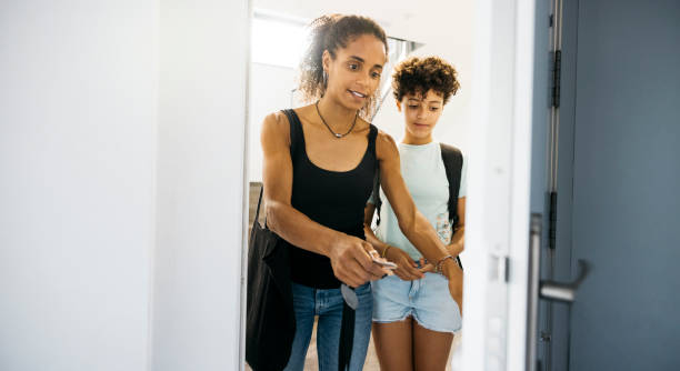 istock Mother and her daughter arriving home 1743100800