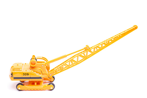 building crane construction machinery toy isolated on white background.