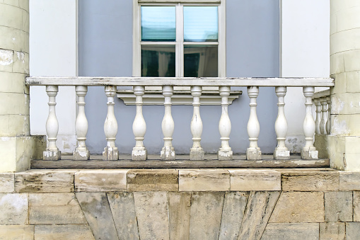Beautiful old ornamental balcony, background with copy space, horizontal composition