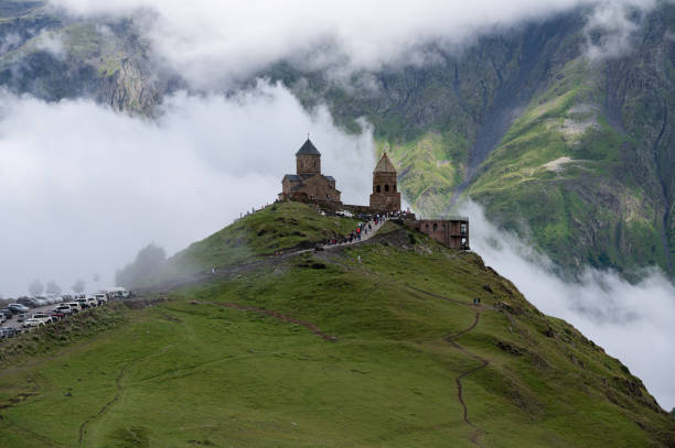 istock A view of the iconic Trinity Church in Stepantsminda surrounded by low clouds 1743124785