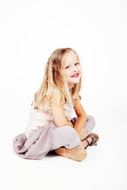 istock 4 Year Old Girl Sitting down 174313376