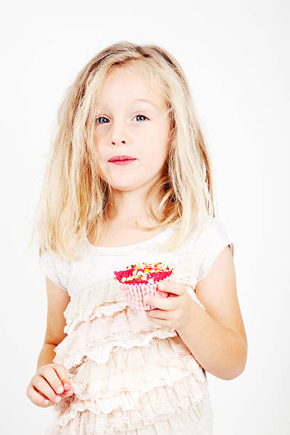 istock 4 Year Old Girl with Cupcake 174313387