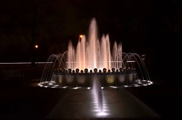 night time water fountain with lights