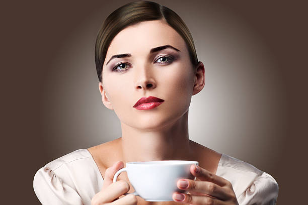istock Woman  with cup of aromatic coffee or tea 174316215