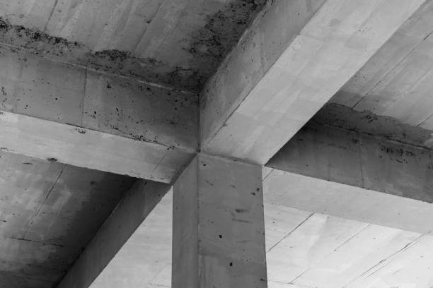 istock Abstract concrete interior background, ceiling construction with girders 1743165795