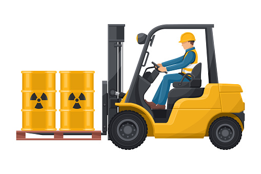 Safely drive a forklift. Fork lift truck transporting a pallet with a barrel of radioactive materials. Safety when driving forklifts. safety first. Industrial Safety and Occupational Health