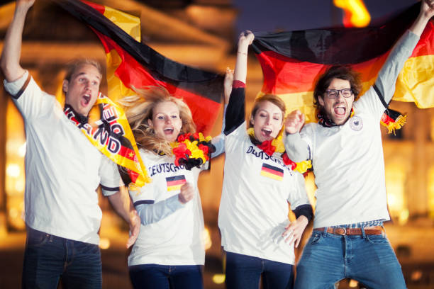 istock German Soccer Fans Jumping 174318370
