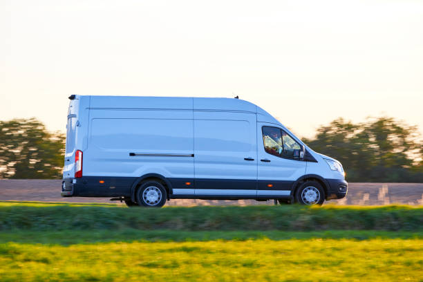 istock White Van driving fast on a country road. 1743230897