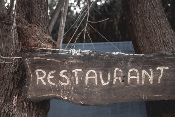 istock restaurant word on the wooden board. 1743232336